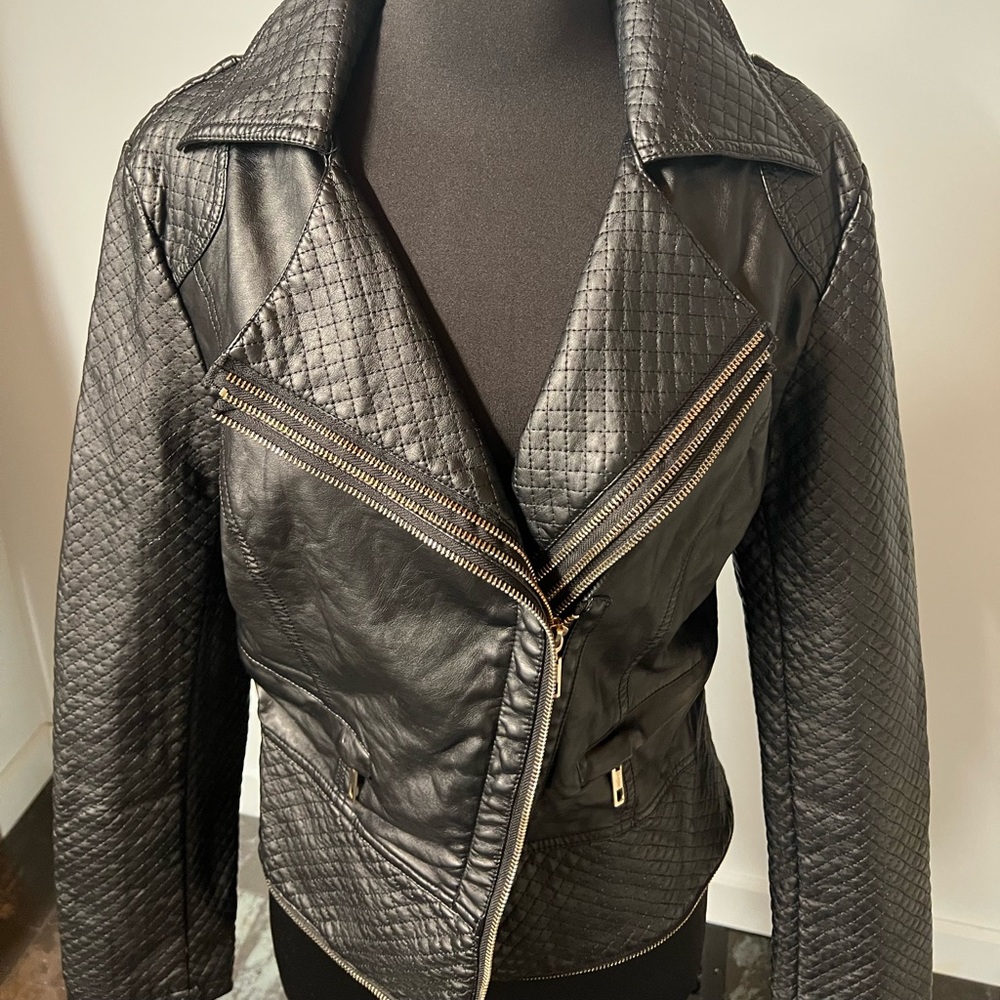 Faux leather Moto jacket. New never worn.